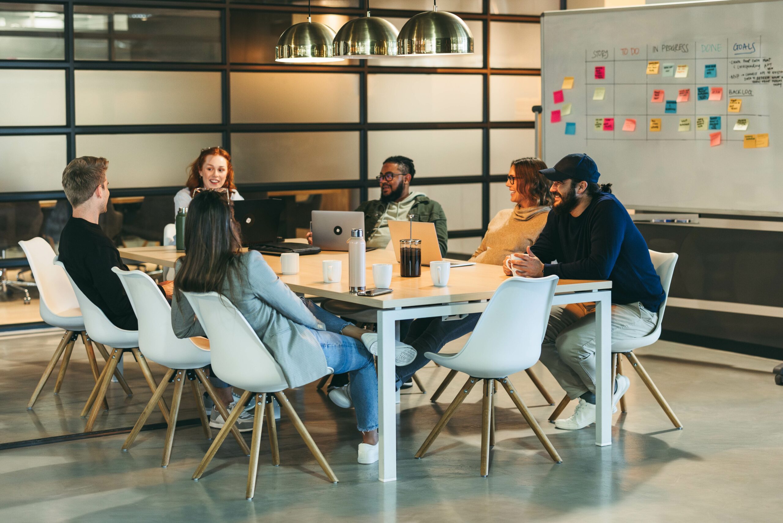 Team office meeting: Innovating solutions for software development in a tech company